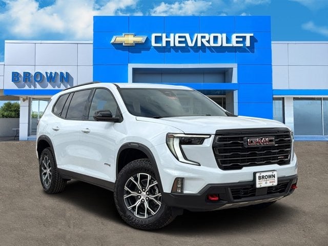 2026 GMC Acadia AT4 in Glacier White Tricoat — front three-quarter view