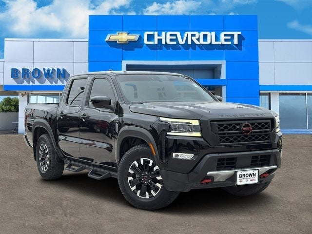 2022 Nissan Frontier PRO-X in Black — front three-quarter view