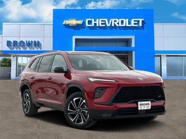 2026 Buick Enclave Sport Touring in Cherry Red Tintcoat — front three-quarter view